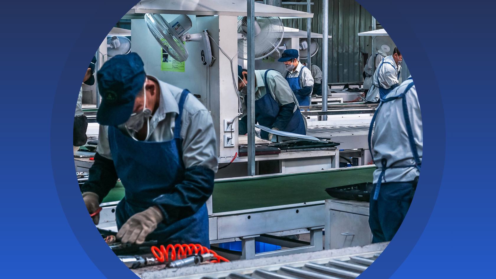 Photo of operators working a factory line