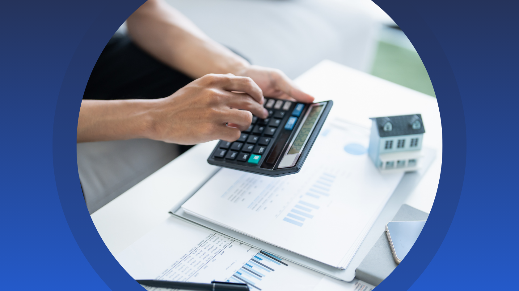 Photo of a procurement practitioner using a calculator.